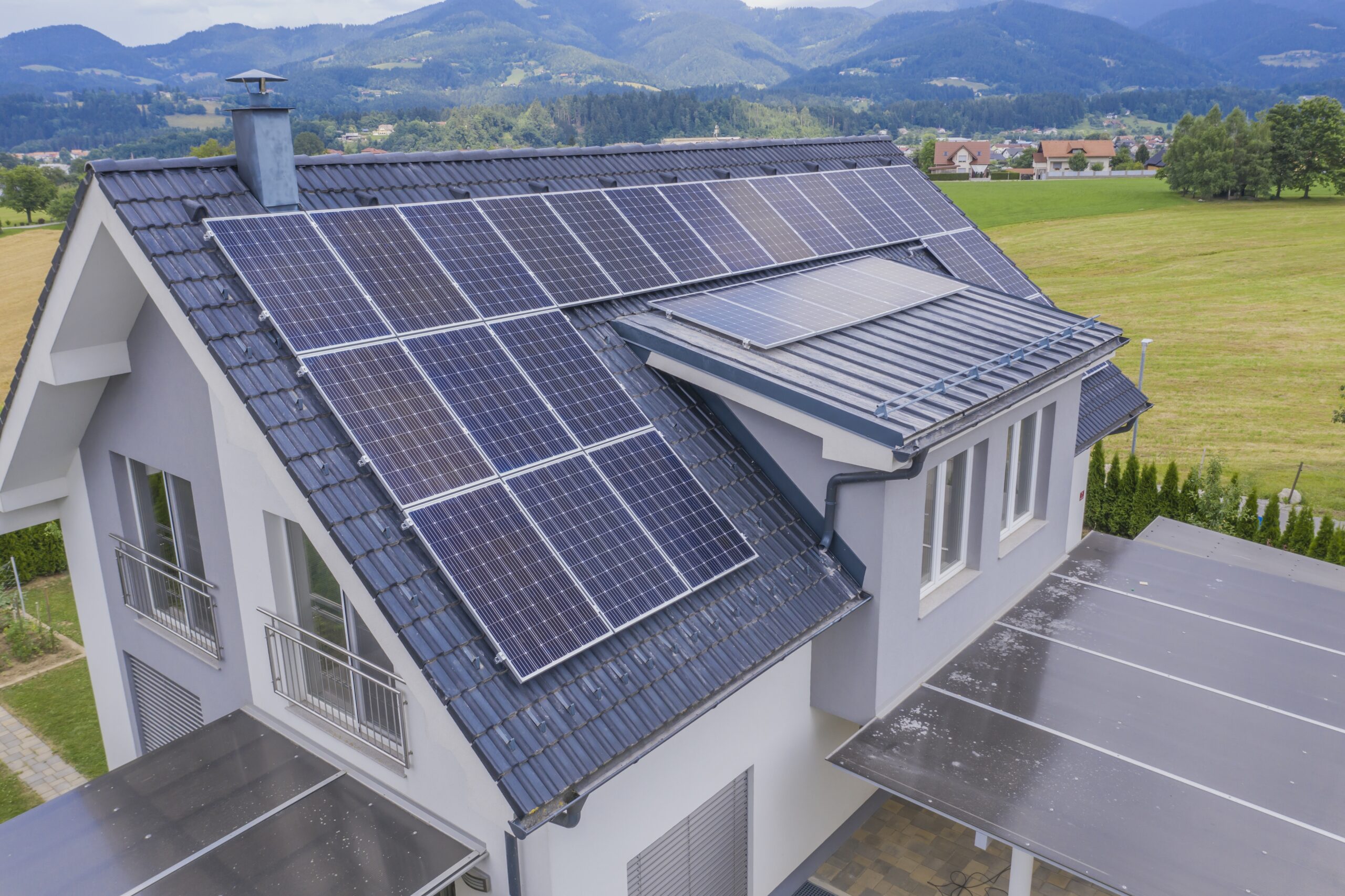 private house in a valley with solar panels