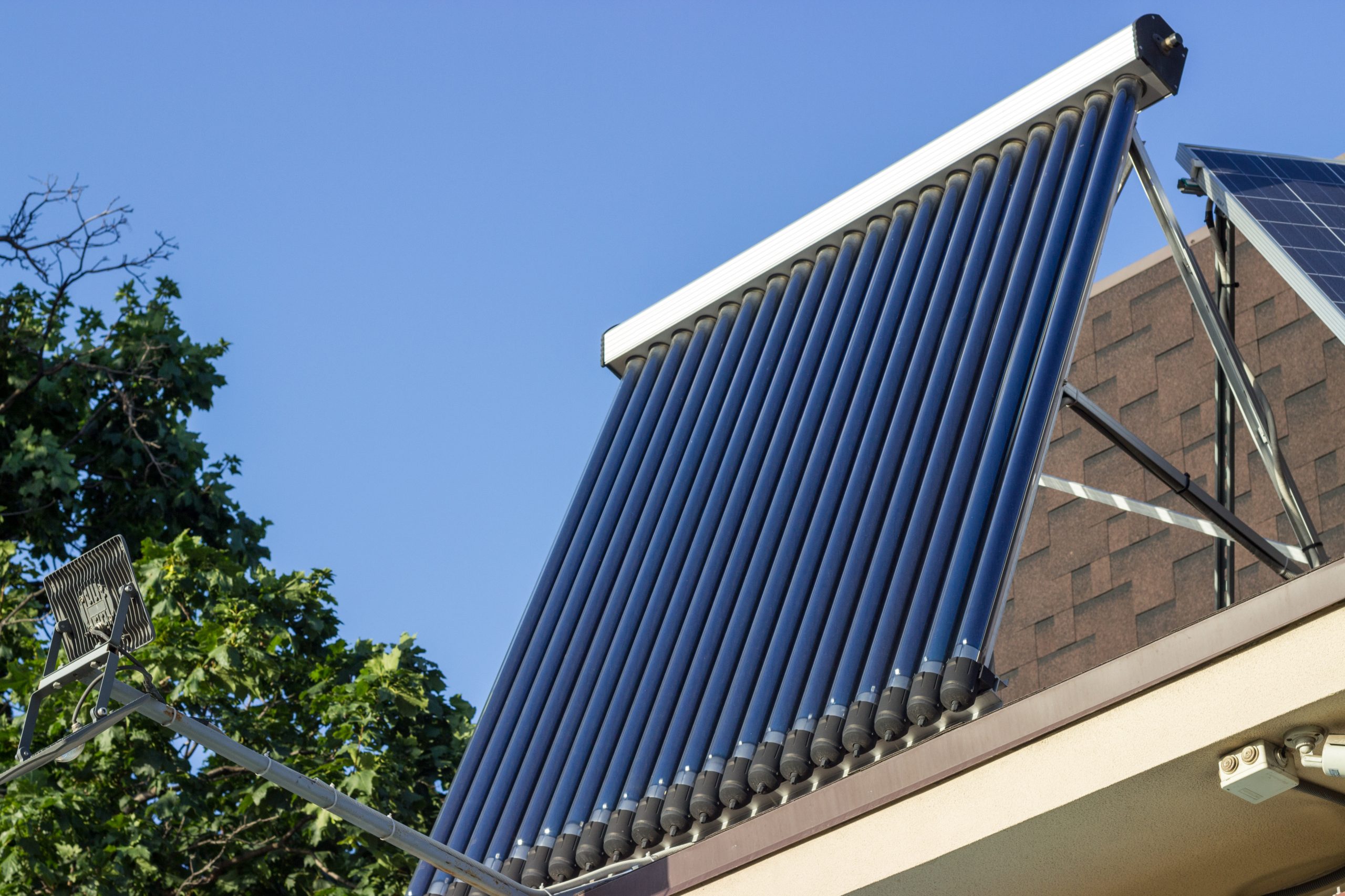 blue-solar-panels-on-a-sunny-rooftop-2026-03-25-09-18-23-utc